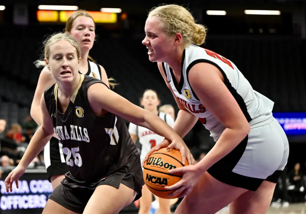 Meghan Rehmeier #25 of Laguna Hills reaches for the ball...