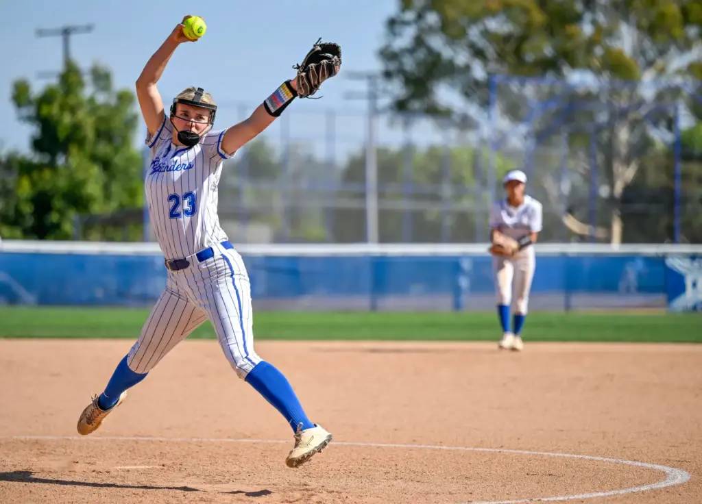 La Habra starting pitcher Madison Payne throws to home plate...