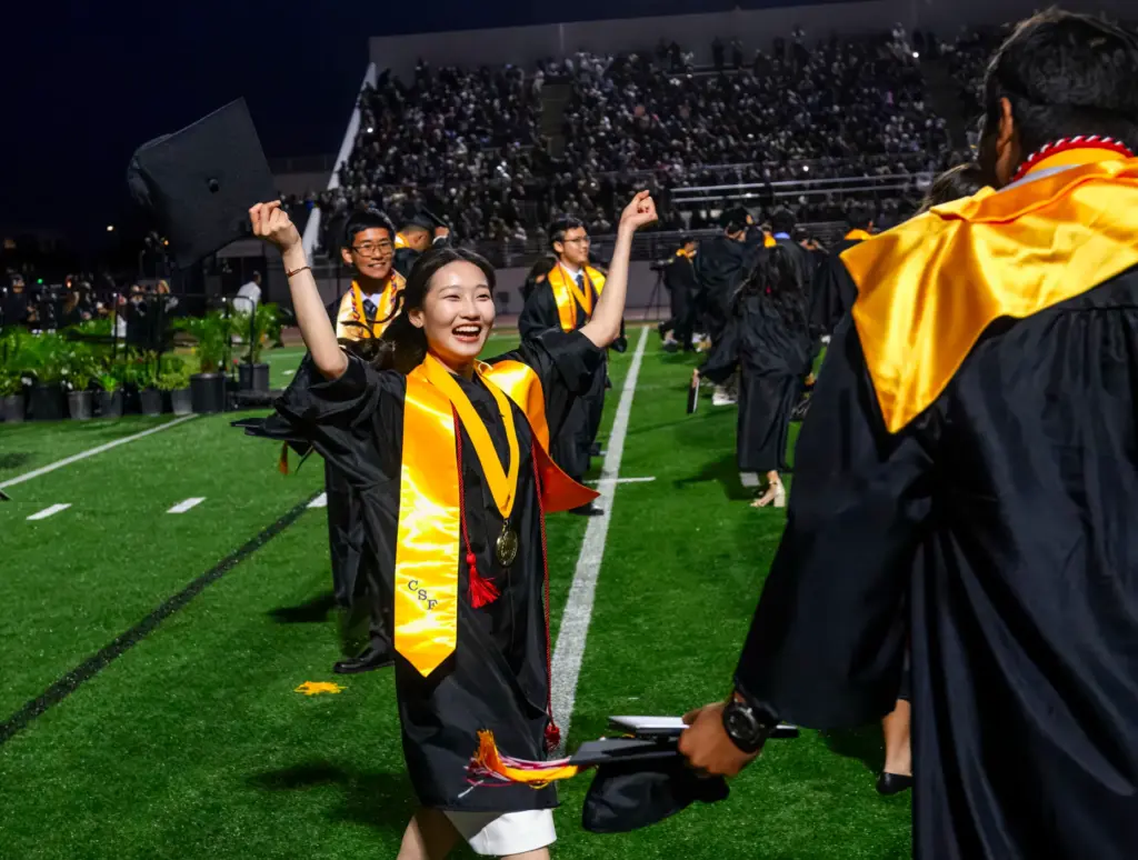 A jubilant Olivia Ng celebrates following the Troy High School...