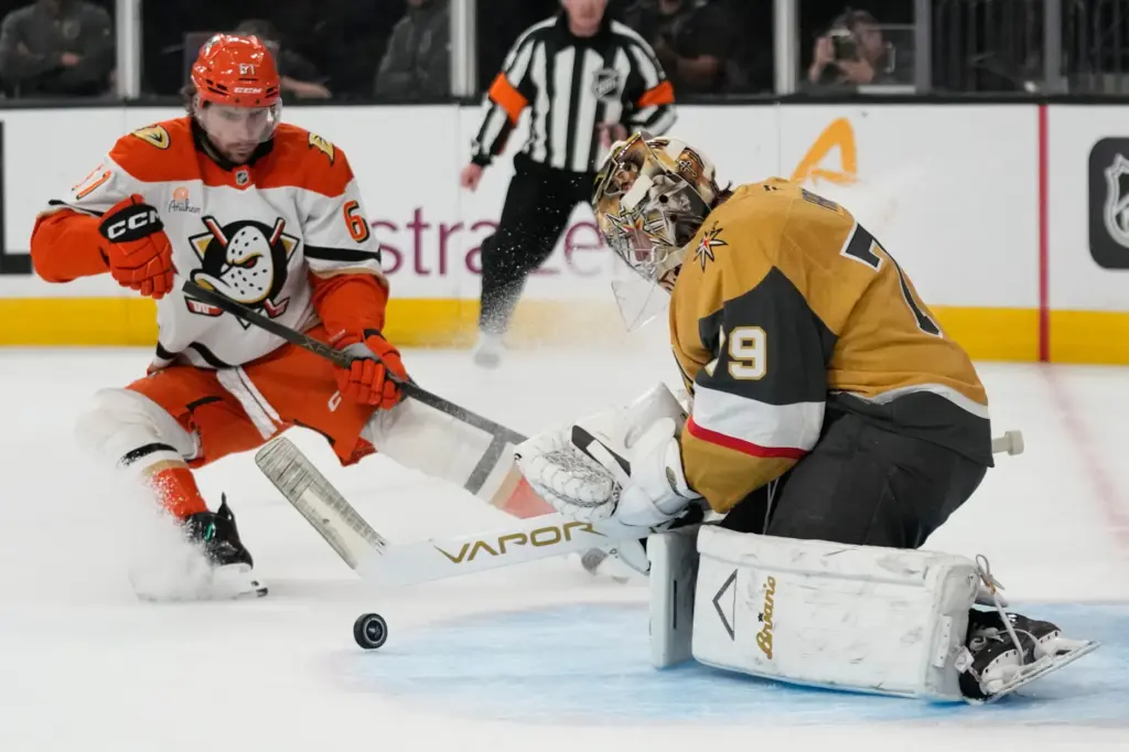 Vegas Golden Knights goaltender Carter Hart (79) stops a shot...