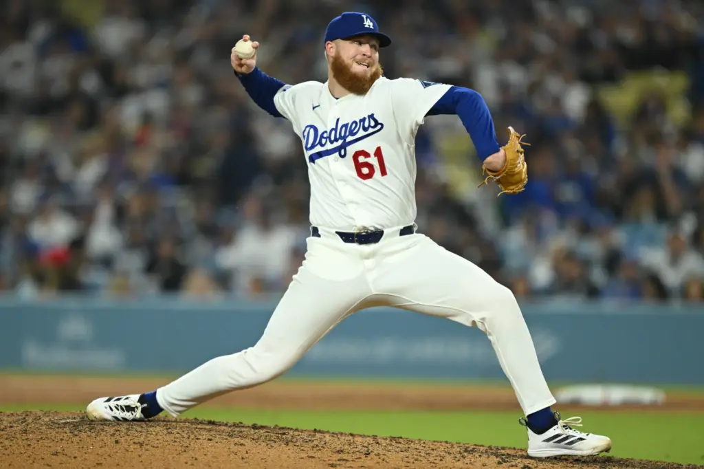 Dodgers relief pitcher Will Klein throws to the plate during...