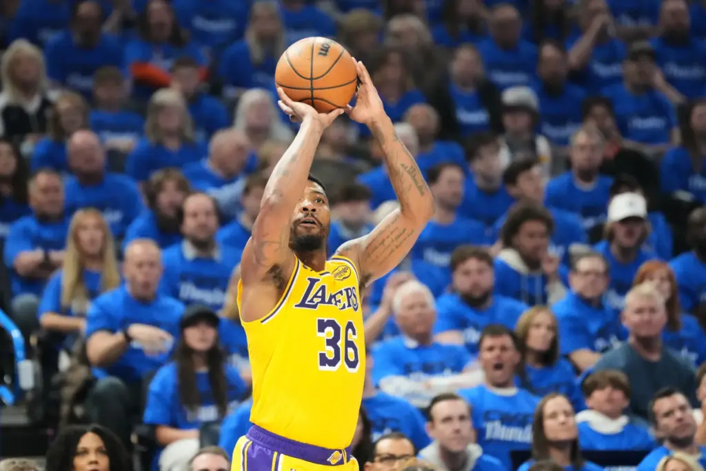Lakers guard Marcus Smart shoots during the first half of...