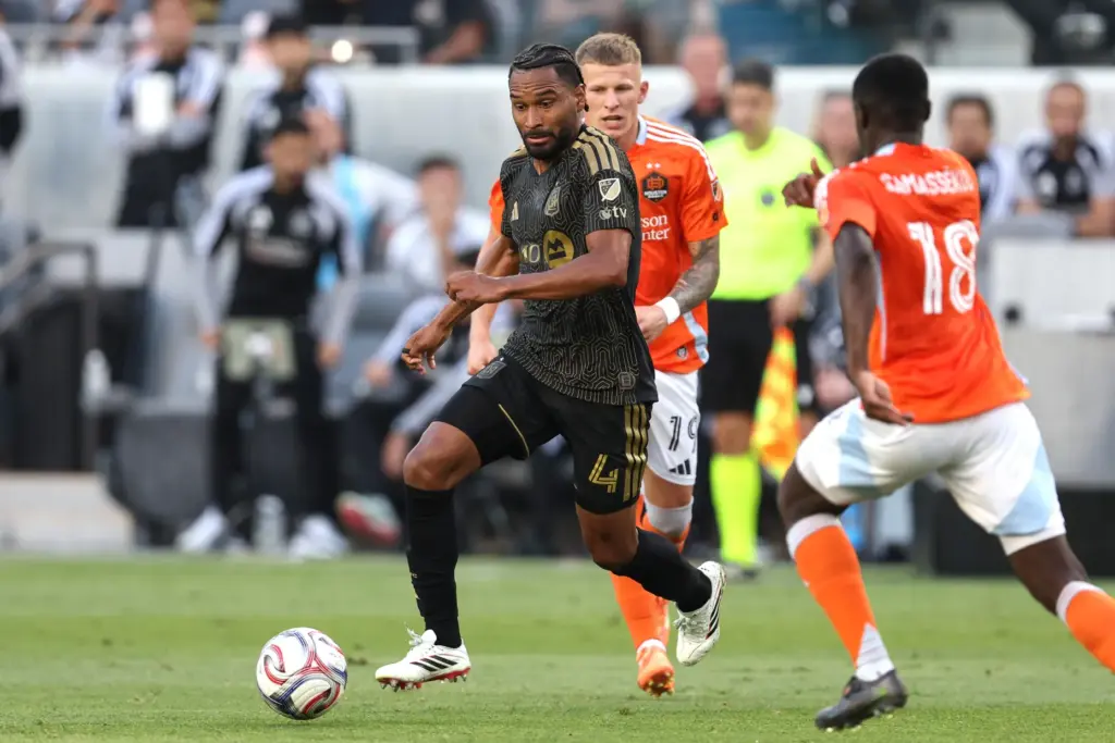 LAFC defender Eddie Segura (4) moves the ball against the...