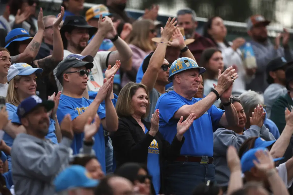 UCLA fans cheer on the Bruins after they defeated South...