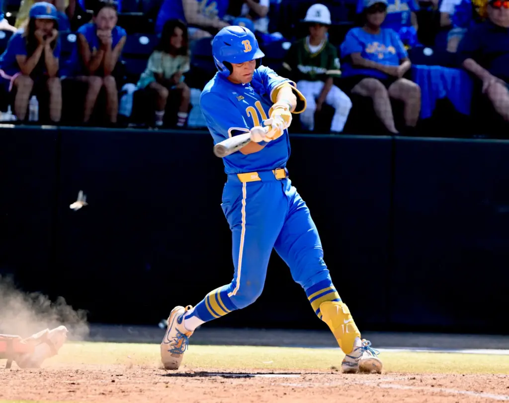 Roch Cholowsky #1 of the UCLA Bruins flies out with...