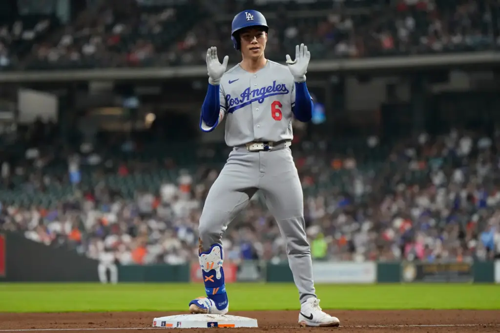 The Dodgers’ Hyeseong Kim celebrates a triple during the seventh...