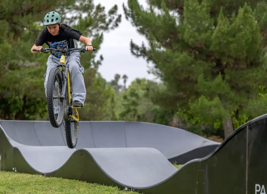 Grayson DiBlasi, 13, of Mission Viejo launches his bike off...