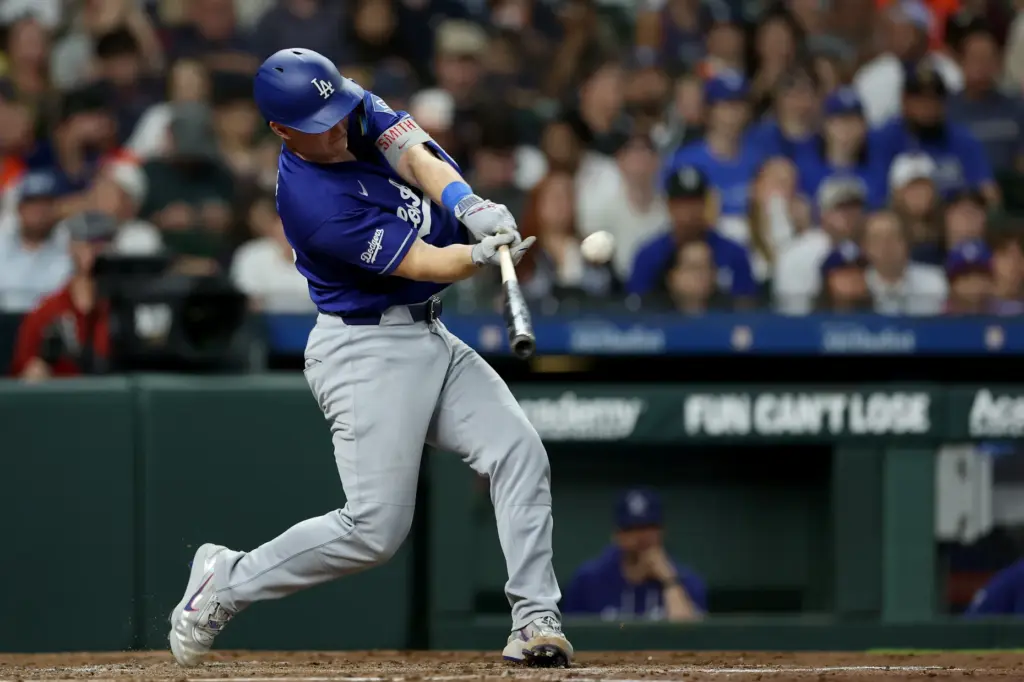 The Dodgers’ Will Smith hits an RBI double during the...