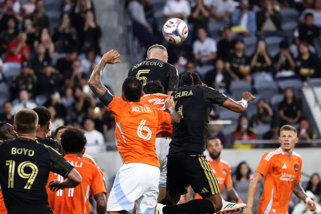 Los Angeles FC defender Ryan Porteous (5) heads the ball...