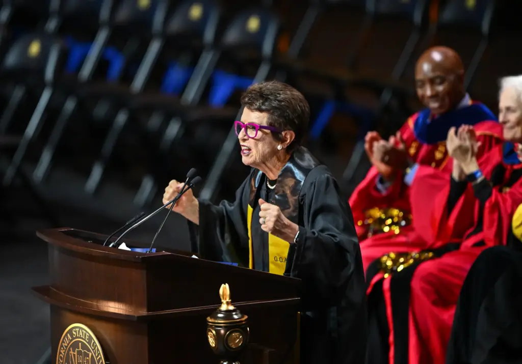 Billie Jean King delivers the keynote address during graduation for...