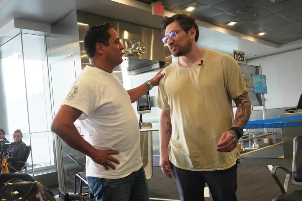 Tyler Graf speaks to Kyle Adler