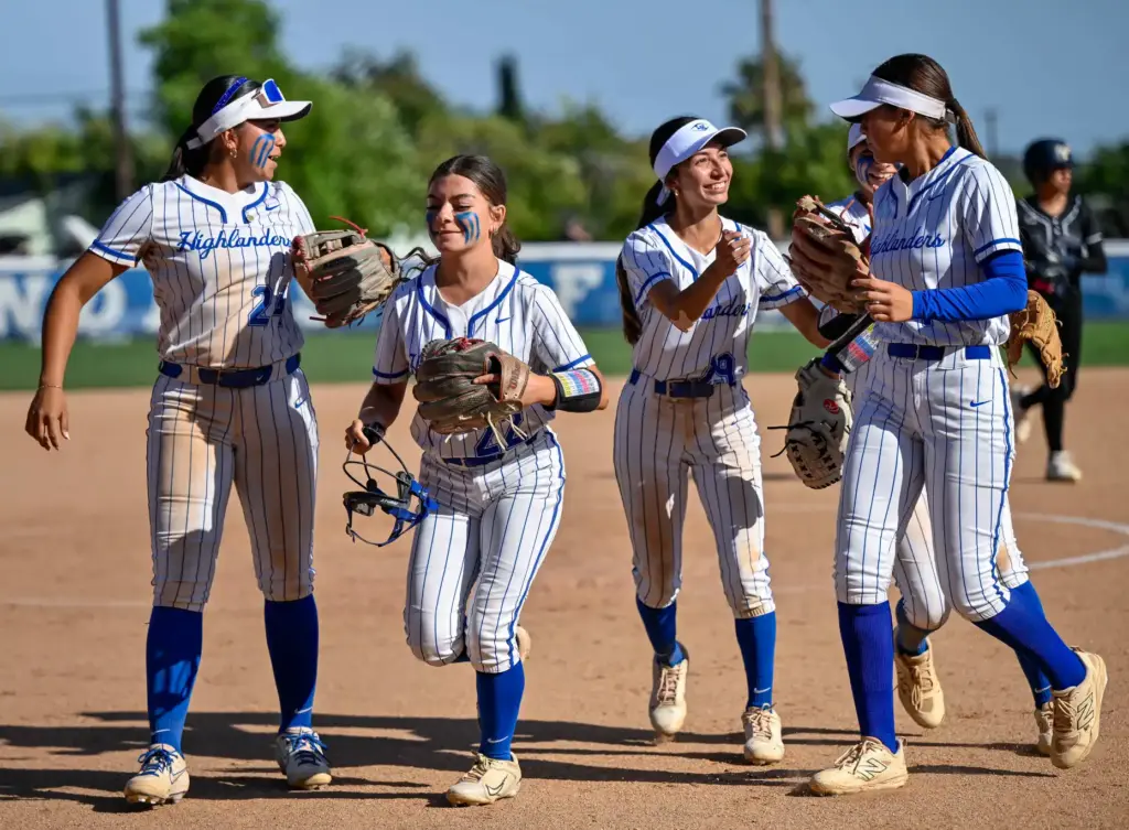 La Habra players celebrate their victory over Pacifica following a...