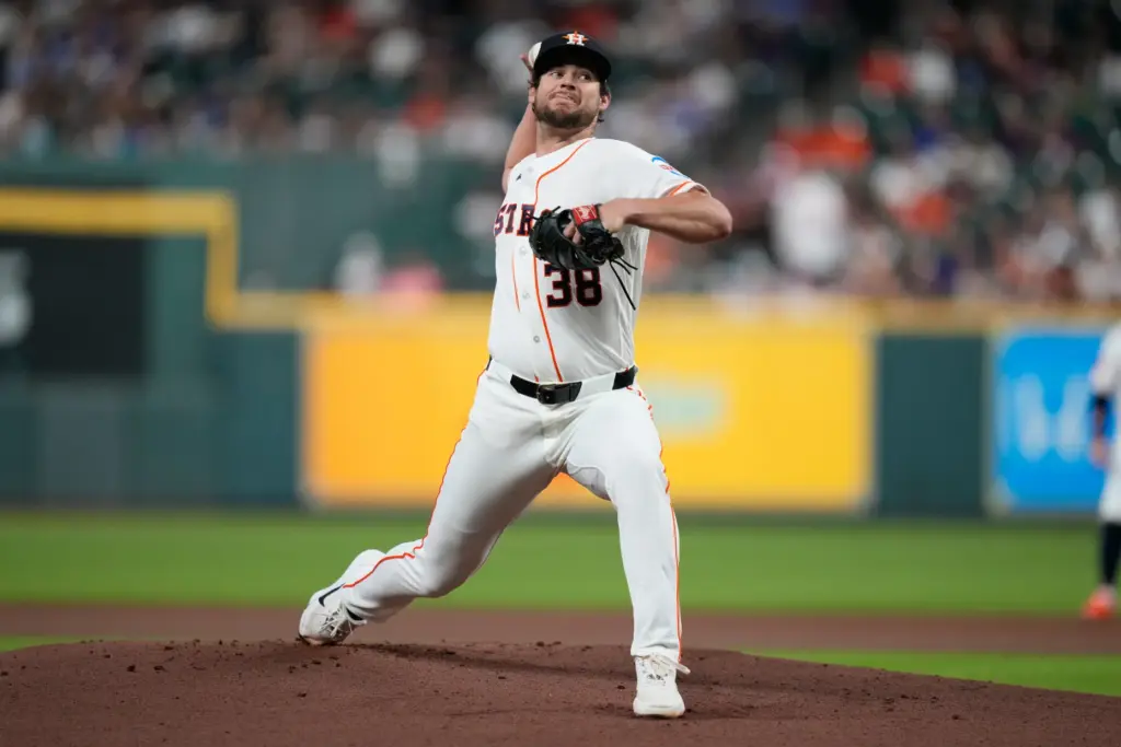 Houston Astros starting pitcher Peter Lambert throws to the plate...
