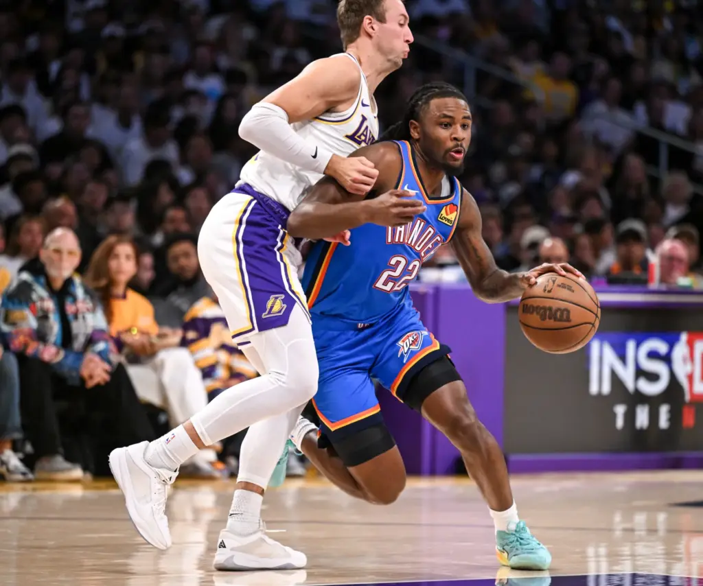 The Oklahoma City Thunder’s Cason Wallace comes up with the...