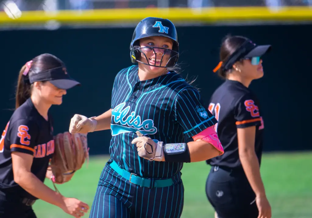 Aliso Niguel’s Tessa Cowsill rounds the bases after hitting a...