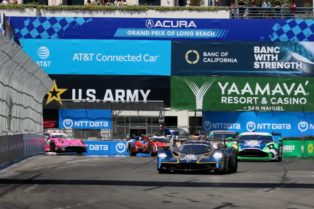 Cars make the turn away from Seaside Way in the...