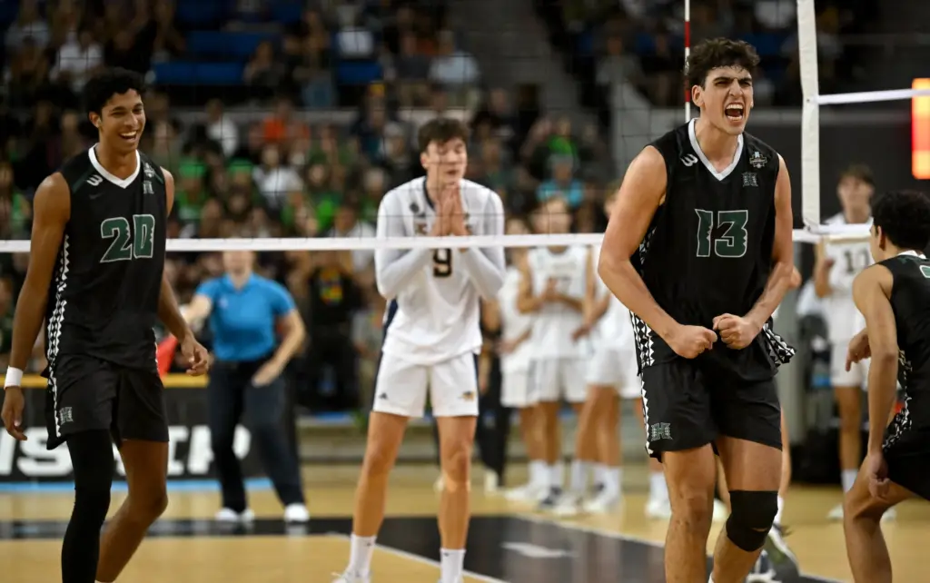 Hawaiiâs Tread Rosenthal (13) celebrates after scoring a point during...