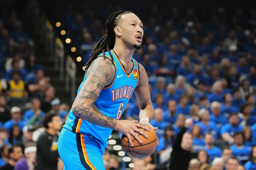Oklahoma City Thunder forward Jaylin Williams looks to pass the...
