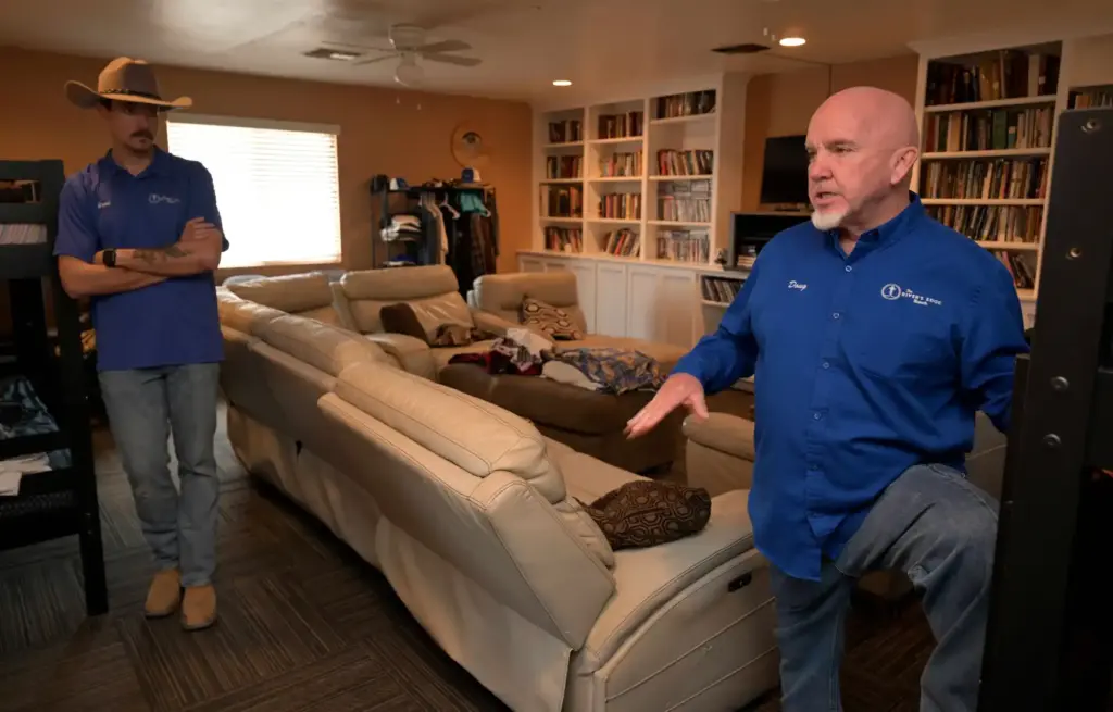 River’s Edge Ranch CEO Doug Whiteman, right, stands in the...