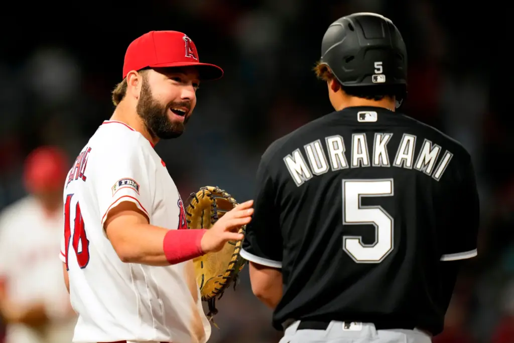 Angels first baseman Nolan Schanuel, left, chats with the Chicago...