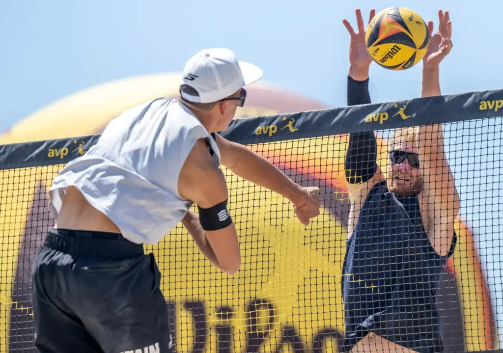 Chase Budinger, right, a former NBA basketball player, blocks a...