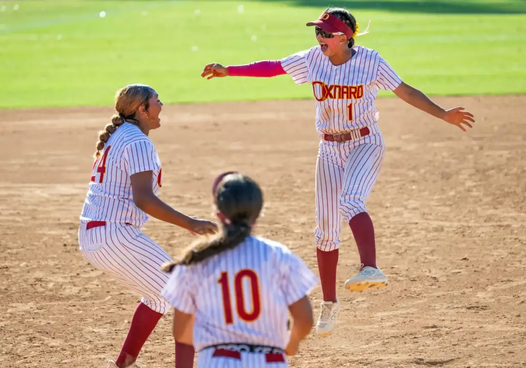 Oxnard players celebrate their 3-1 win over Mission Viejo in...