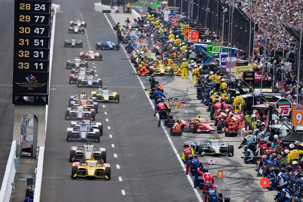 Car enter the pit area during a yellow flag during...