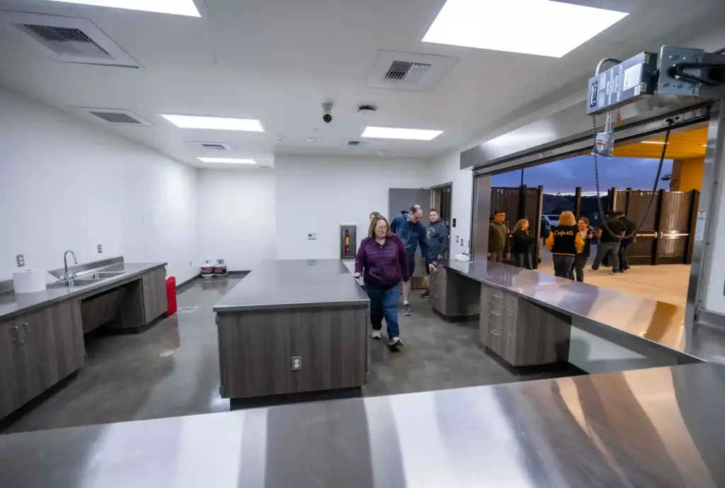 Capistrano Valley High School families tour a new commission stand...