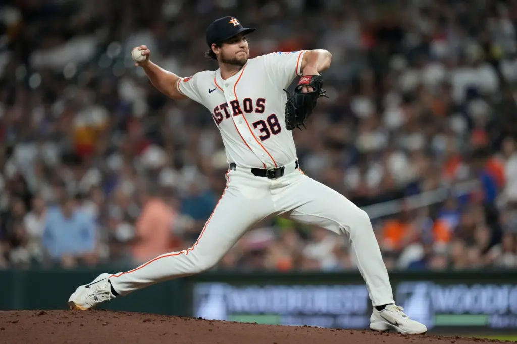 Houston Astros starting pitcher Peter Lambert throws to the plate...