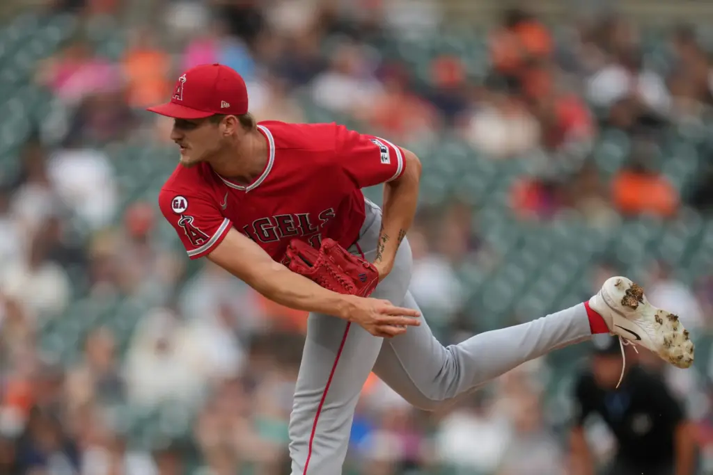 Angels starting pitcher Jack Kochanowicz throws to the plate during...