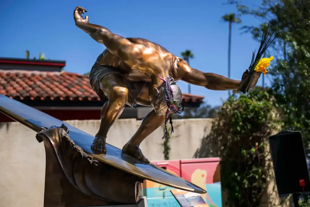The bronze statue depicting Mickey MuÃ±oz in his famous Quasimodo...