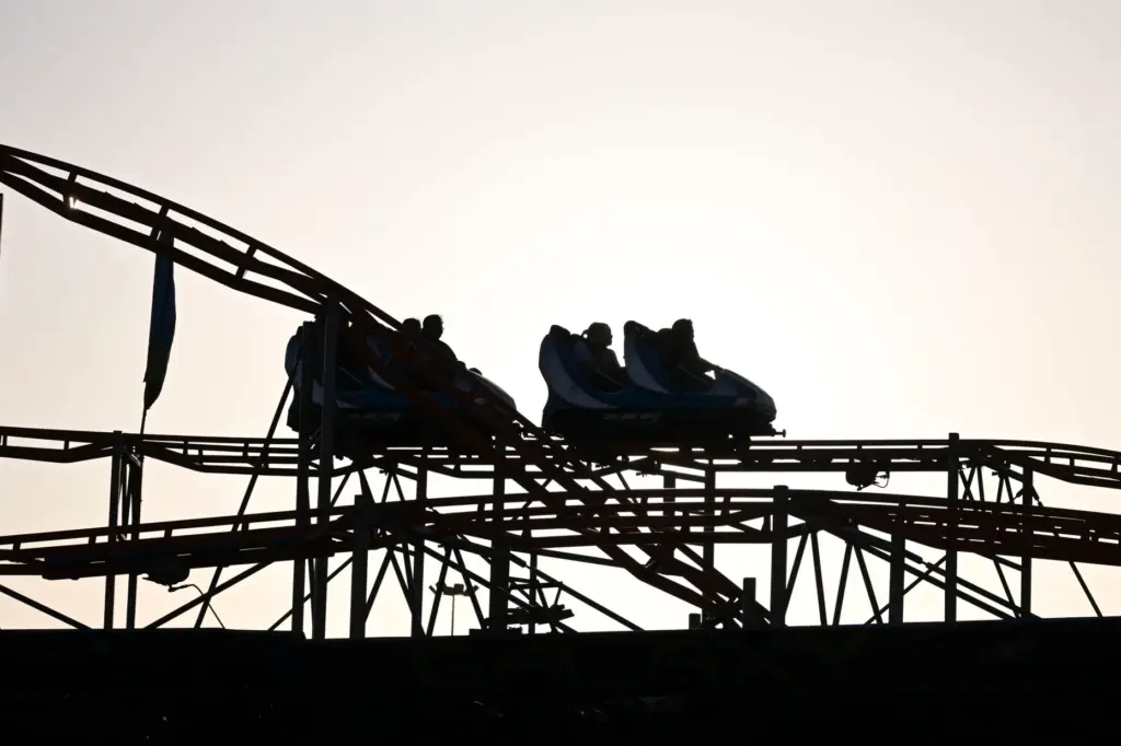 Fairgoers enjoy the rides during the final weekend of the...