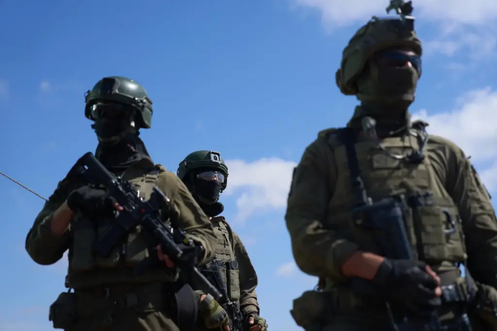 Israeli soldiers occupy a military position