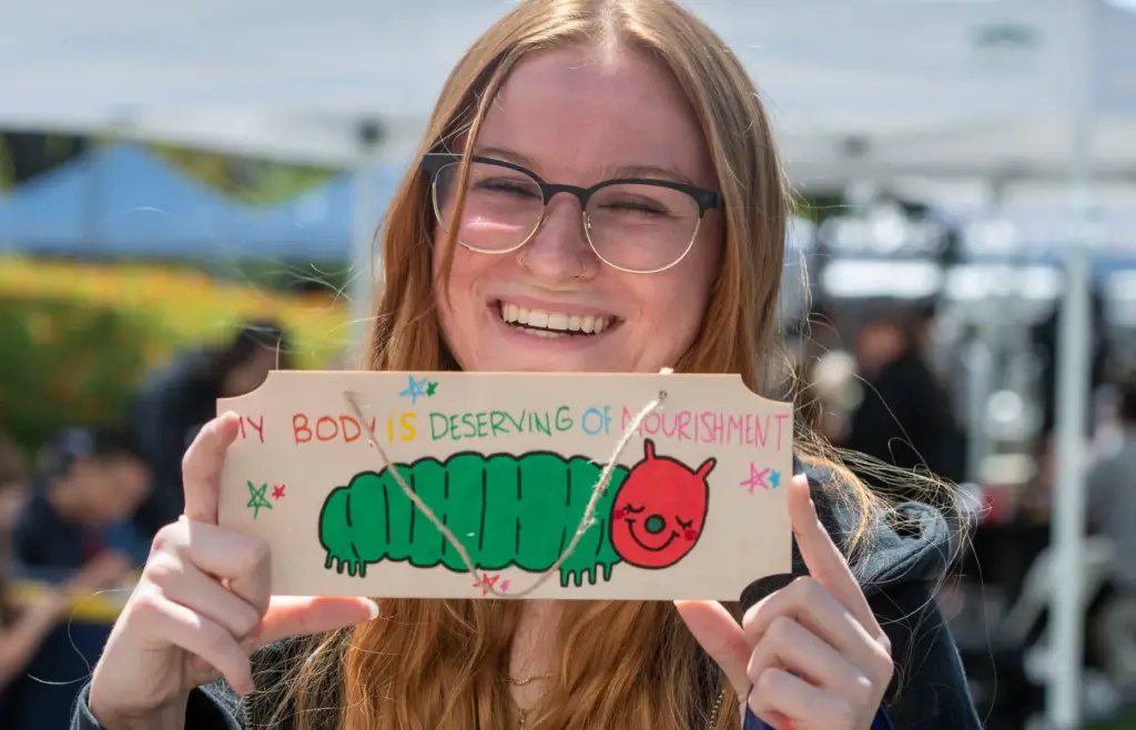 One student shows off her free affirmation Tuesday in the...