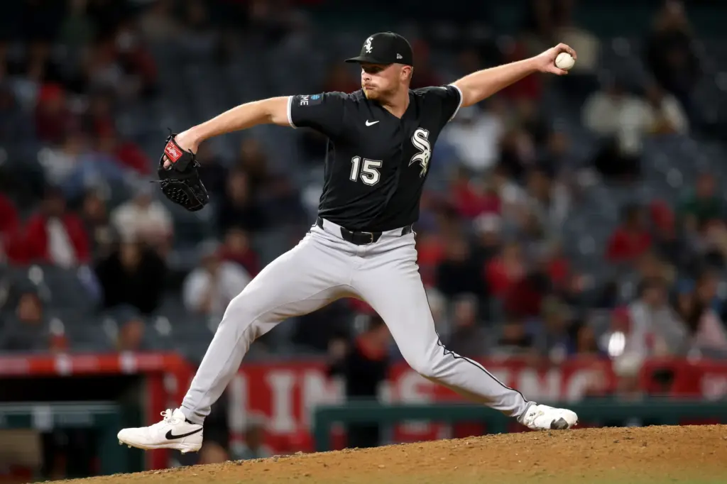 Chicago White Sox relief pitcher Sean Newcomb throws to the...