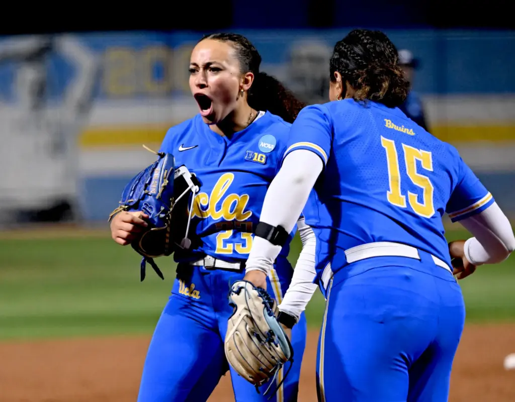 Starting pitcher Taylor Tinsley #23 of the UCLA Bruins reacts...
