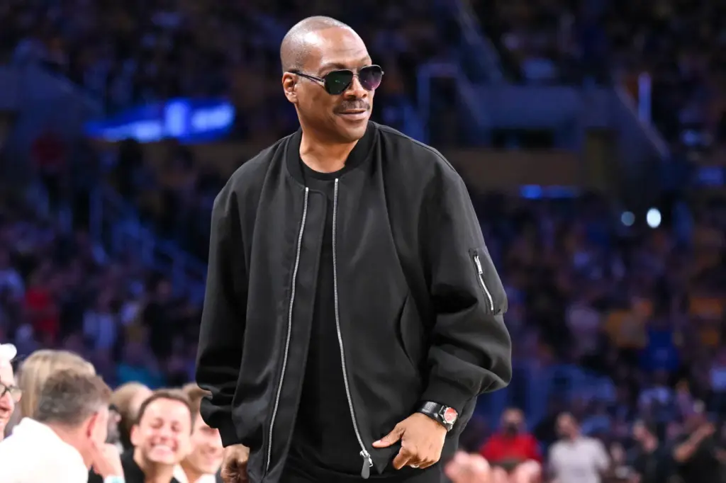 Actor Eddie Murphy looks on as he walks on the...