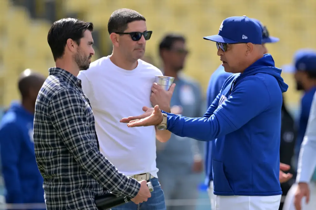 From left, Dodgers general manager Brandon Gomes, minority owner Alan...