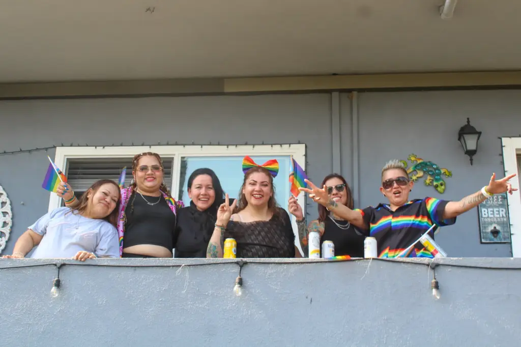 People celebrated from their balconies during the 43rd annual Long...