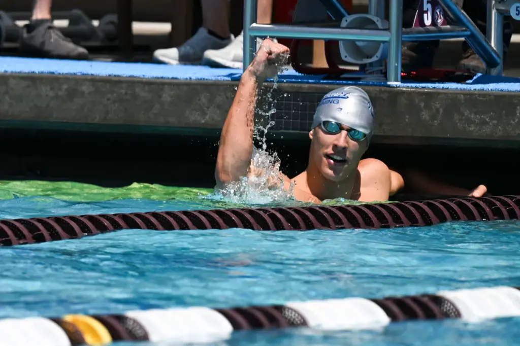 Connor Ohl of Newport Harbor high school raises his first...
