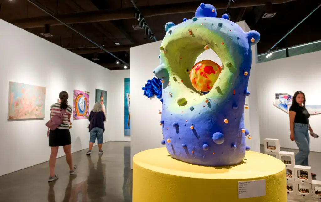 âPhagocytosis,â center, a mixed-media piece by San Bernardino artist Amanda...