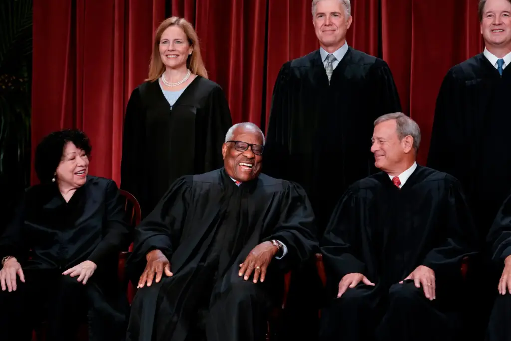 Members of the Supreme Court sit for a new group portrait.