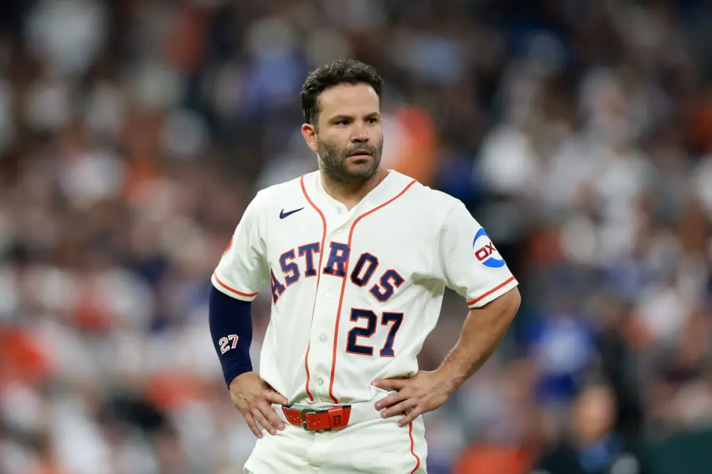 The Houston Astros’ Jose Altuve looks on after striking out...
