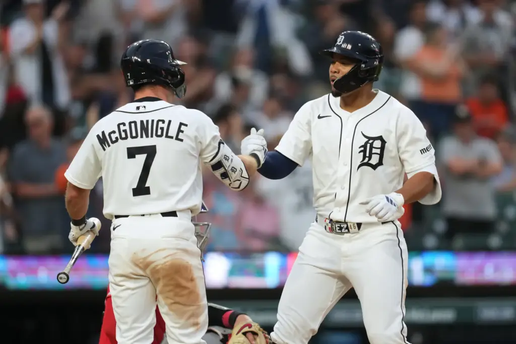 The Detroit Tigers’ Wenceel PÃ©rez, right, celebrates his home run...