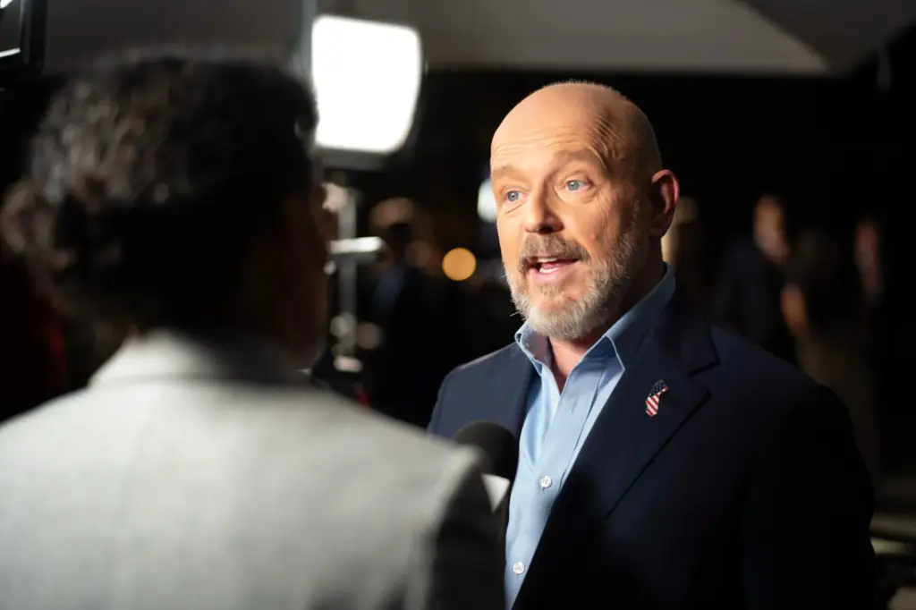 Gubernatorial candidate Steve Hilton talks with media after a debate...