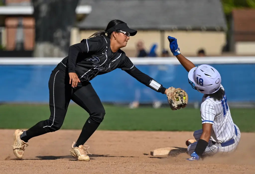 La Habra outfielder Georgia Rickenbacker, right, slides safely into second...