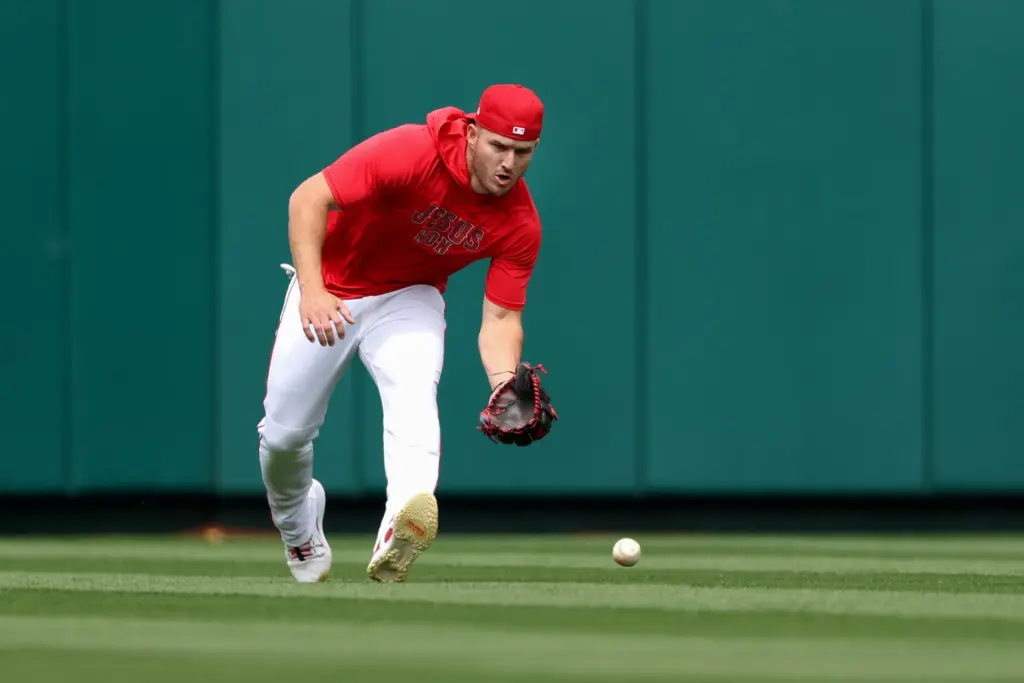 Angels center fielder Mike Trout warms up in the outfield...