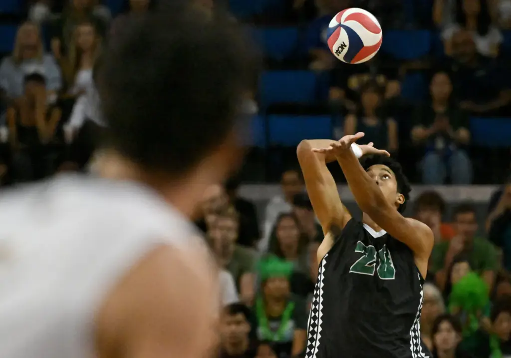 Hawaiiâs Trevell Jordan serves during the NCAA men’s volleyball national...