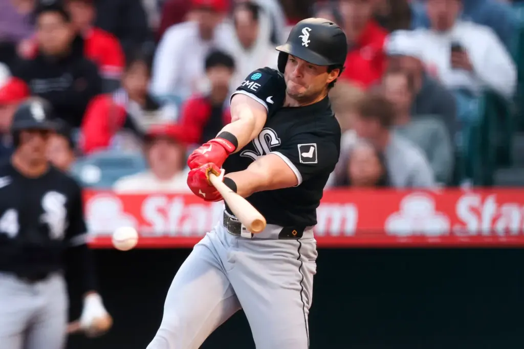 The Chicago White Sox’s Andrew Benintendi hits an RBI single...