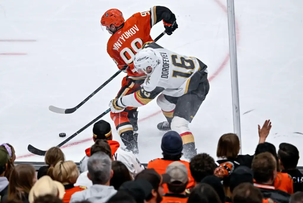 The Ducksâ Pavel Mintyukov, left, and the Vegas Golden Knightsâ...